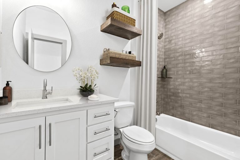 bathroom vanity round mirror white cabinets floating shelves