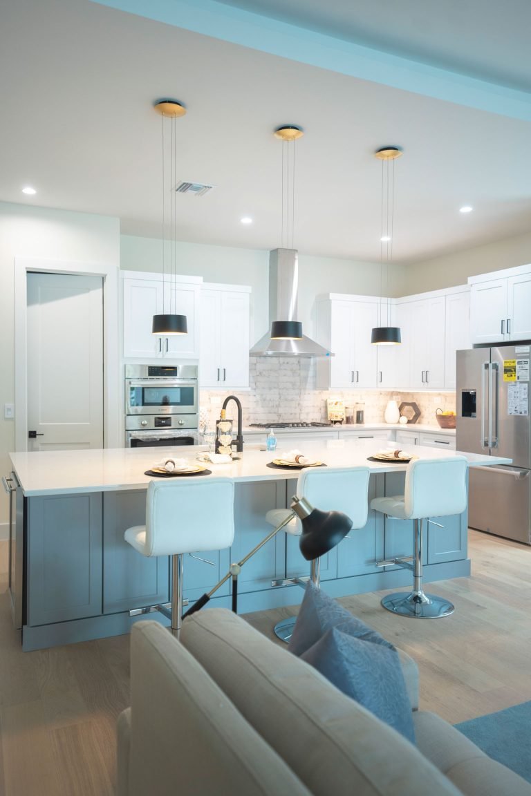 kitchen living room gray island white rta cabinets