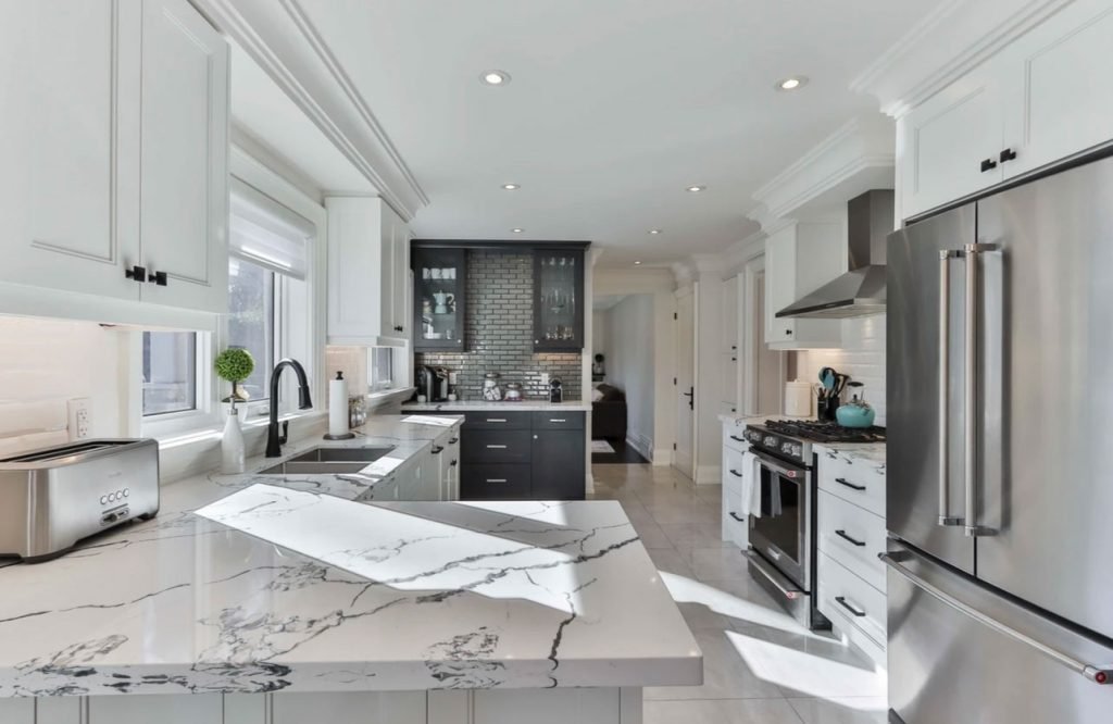 white marble framed countertop custom cabinets seattle crop