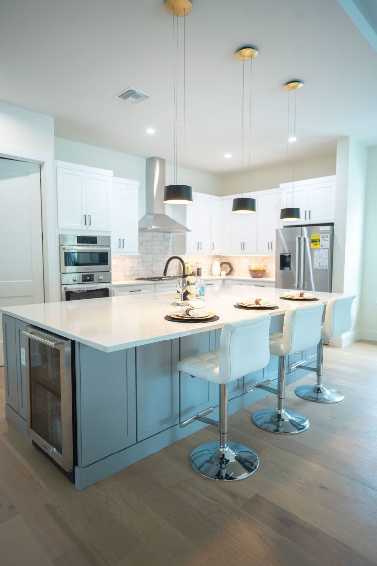 white rta kitchen cabinets with stainless steel chair seattle